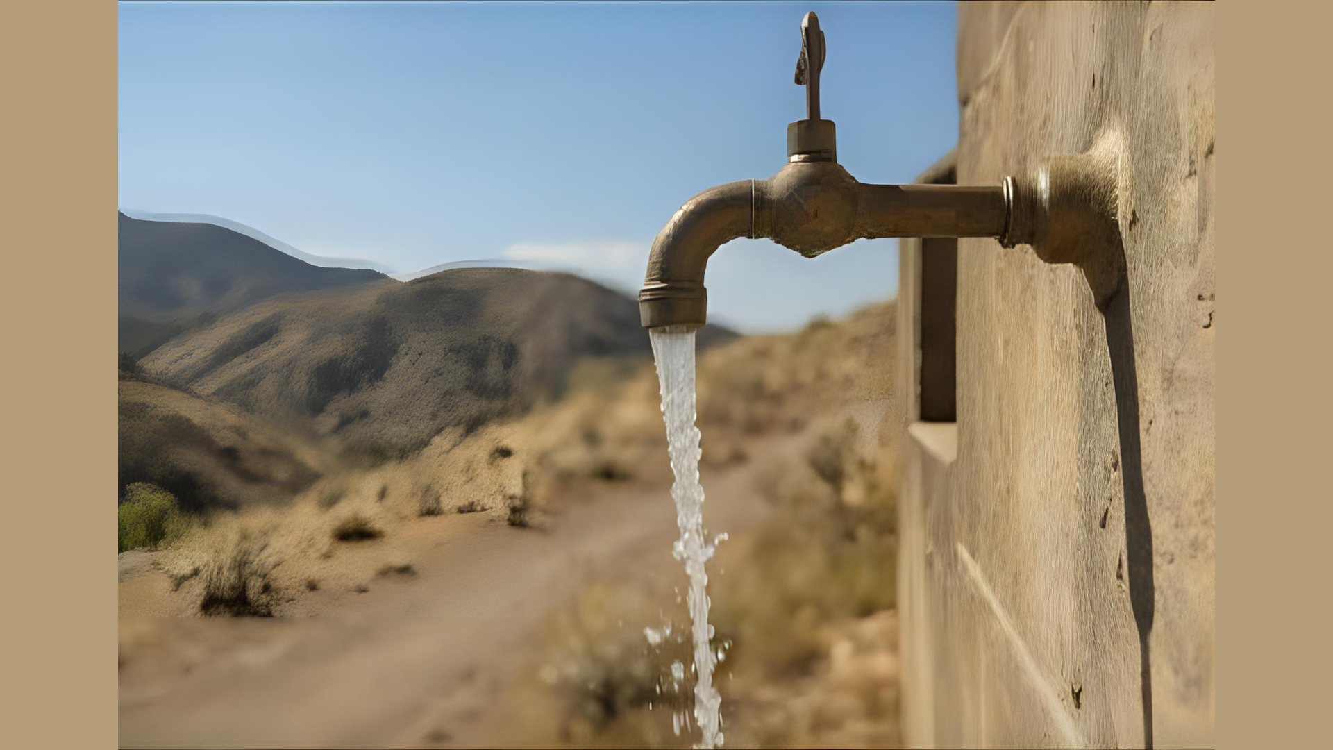 Outdoor faucet running water against dry California hills