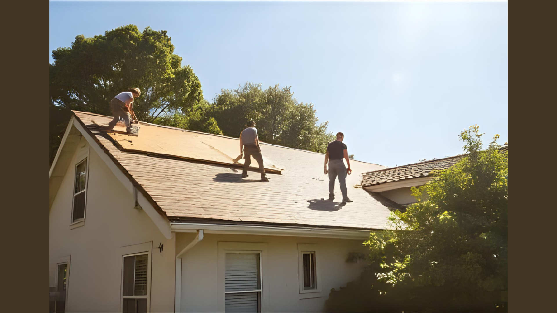 Roofing crew replacing shingles on a California home